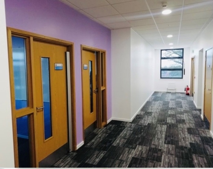 Corridors & wayfinding colour scheme in a school decorated by Olympian Decor